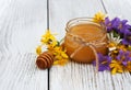 Jar of honey with wildflowers Royalty Free Stock Photo