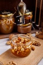 Jar of honey with nuts.