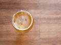 Jar of honey on a wooden table. view from above. place to write. Concept image of a jar of honey