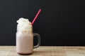 Jar with hot chocolate drink with wipped cream Royalty Free Stock Photo