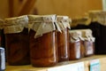 Jar of jam on a wooden shelf Royalty Free Stock Photo