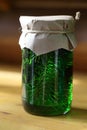 Jar of jam on a wooden shelf Royalty Free Stock Photo