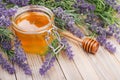 Jar of liquid honey with lavender