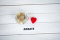 Jar with money on white wood background. Donate conception Royalty Free Stock Photo