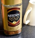 Nescafe Gold Blend instant coffee and cup