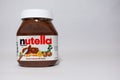 A jar of Nutella Hazelnut Spread with Cocoa isolated on a white background