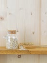 A jar of oatmeal flakes and wheat Royalty Free Stock Photo