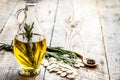 Jar with oil with pepitas on wooden table background mock up