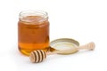 Jar of open honey with drizzler