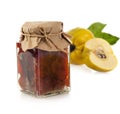 Jar of quince jam with ginger and fresh quince