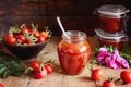 A jar of rose hip jelly and fresh rose hips Royalty Free Stock Photo