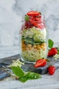 Salad with strawberries and chickpeas in a jar. Royalty Free Stock Photo