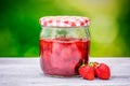 Jar strawberry jam blur nature Royalty Free Stock Photo