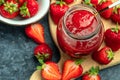 Jar of strawberry jam on white background. Homemade strawberry marmelade and fruits. Long banner format