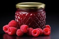 A jar of sweet raspberry jam and fresh organic berries