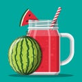 Jar with watermelon smoothie with striped straw.