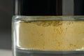 A jar of yellow turmeric facial scrub. Royalty Free Stock Photo
