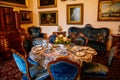 Jaromerice nad Rokytnou, Czech Republic, 06 July 2021: Castle interior with baroque wooden carved furniture, sofa and soft