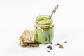 Jarred Kelp puree isolated on white background. Healthy superfood from oceanic seaweed