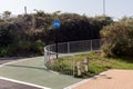 Cycle lane ramp with railing and blue round cycle bike sign