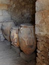 Jars in an ancient old minoan site in Crete, Greece Royalty Free Stock Photo