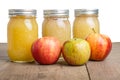 Jars of apple sauce with apples Royalty Free Stock Photo