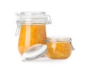 Jars of apricot jam isolated