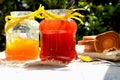 Jars of apricot jam and strawberry jam