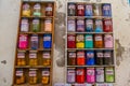 Jars of different colors of dye in Morocco.