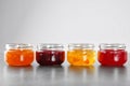 Jars with different sweet jam