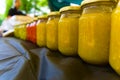 Jars filled with madam jeanette chilli sold on the street fair