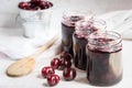 Jars with freshly homemade cherry jam