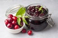 Jars with freshly homemade cherry jam, sour cherry jam, Turkish name; Visne receli