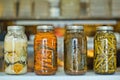 Jars of homemade canned vegetables and pickles