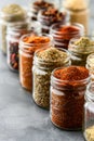 Jars of homemade spice mix lined up, each blend crafted to season and infuse meals with unique flavors