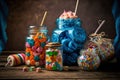 Jars of many delectable candies on a wooden table Royalty Free Stock Photo