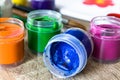 Jars with multi-colored gouache. Set for drawing, creativity and hobbies Royalty Free Stock Photo