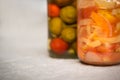 Jars of organic pickled vegetables. Marinated food.