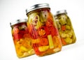 three glass mason canning jars of fresh organic ve Royalty Free Stock Photo