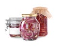 Jars of pickled onions on white Royalty Free Stock Photo