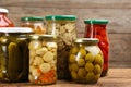 Jars of pickled vegetables on table, closeup Royalty Free Stock Photo