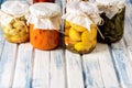 Jars of Tasty Pickled Vegetables Homemade Canned Food Blue and White Wooden Background Copy Space Horizontal Royalty Free Stock Photo