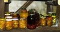 Jars with variety of pickled vegetables fruits Preserved food