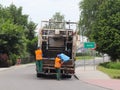 Jaslo, Poland - may 25 2018: Collection and transportation of domestic garbage by municipal service employees. Control of the ecol
