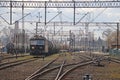 Jaslo/Yaslo, Poland - april 8, 2018: Railway station. Locomotive with an oil tanks wagons. Cargo transportation. Refinery buisnes. Royalty Free Stock Photo