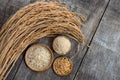 Jasmine brown rice,rice bran, paddy and ear of rice on an old wooden background.top view,flat lay Royalty Free Stock Photo