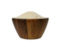 Jasmine rice in a wooden bowl isolated on white background Royalty Free Stock Photo
