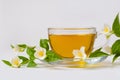 Jasmine tea and Jasmine flowers on a white background Royalty Free Stock Photo