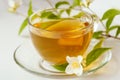 Jasmine tea and Jasmine flowers on a white background Royalty Free Stock Photo