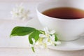 Jasmine tea in a white bone china cup Royalty Free Stock Photo